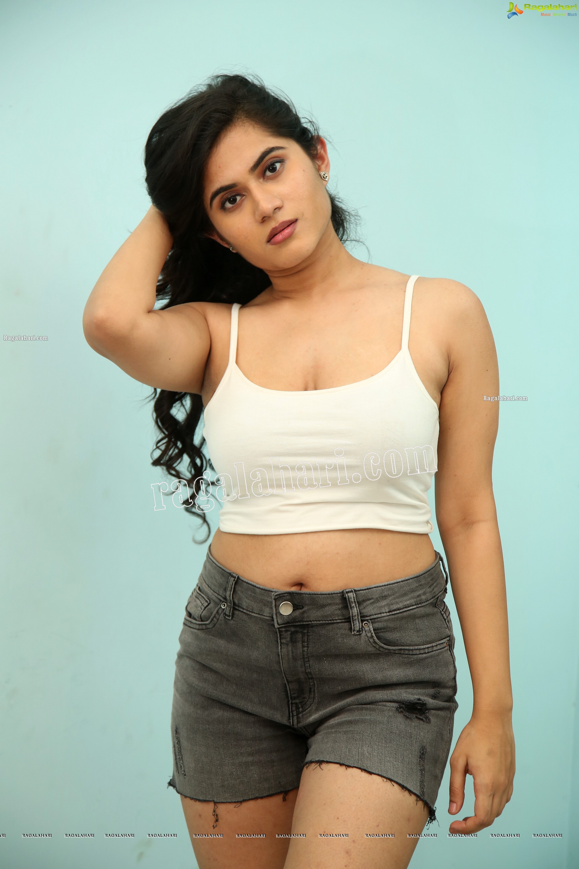 Tara Chowdary in White Spaghetti Strap Crop Top and Shorts, Exclusive Photo Shoot