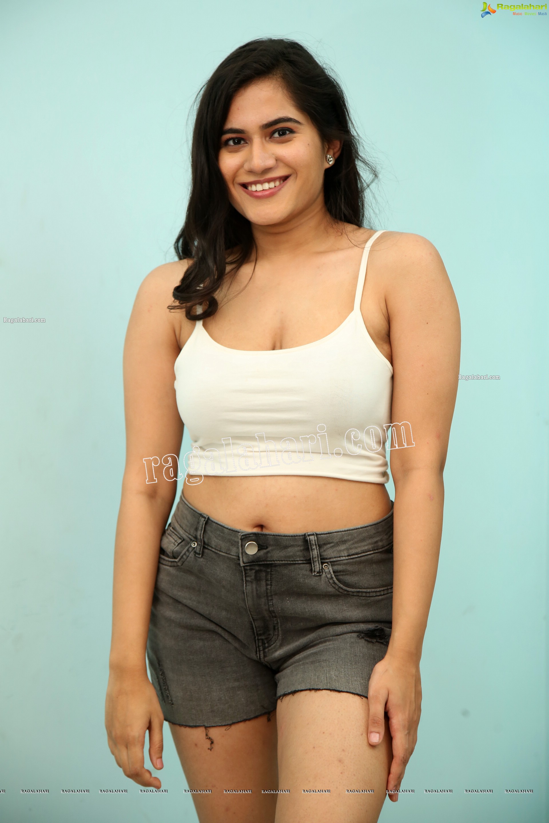 Tara Chowdary in White Spaghetti Strap Crop Top and Shorts, Exclusive Photo Shoot