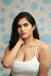 Tara Chowdary in White Spaghetti Strap Crop Top and Jeans