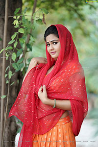 Aparnna Mallik in Orange and Red Half Saree