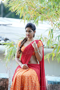 Aparnna Mallik in Orange and Red Half Saree