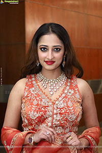 Heena Sheikh stills in Orange Lehenga Choli