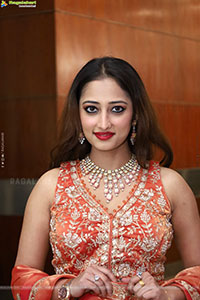 Heena Sheikh stills in Orange Lehenga Choli