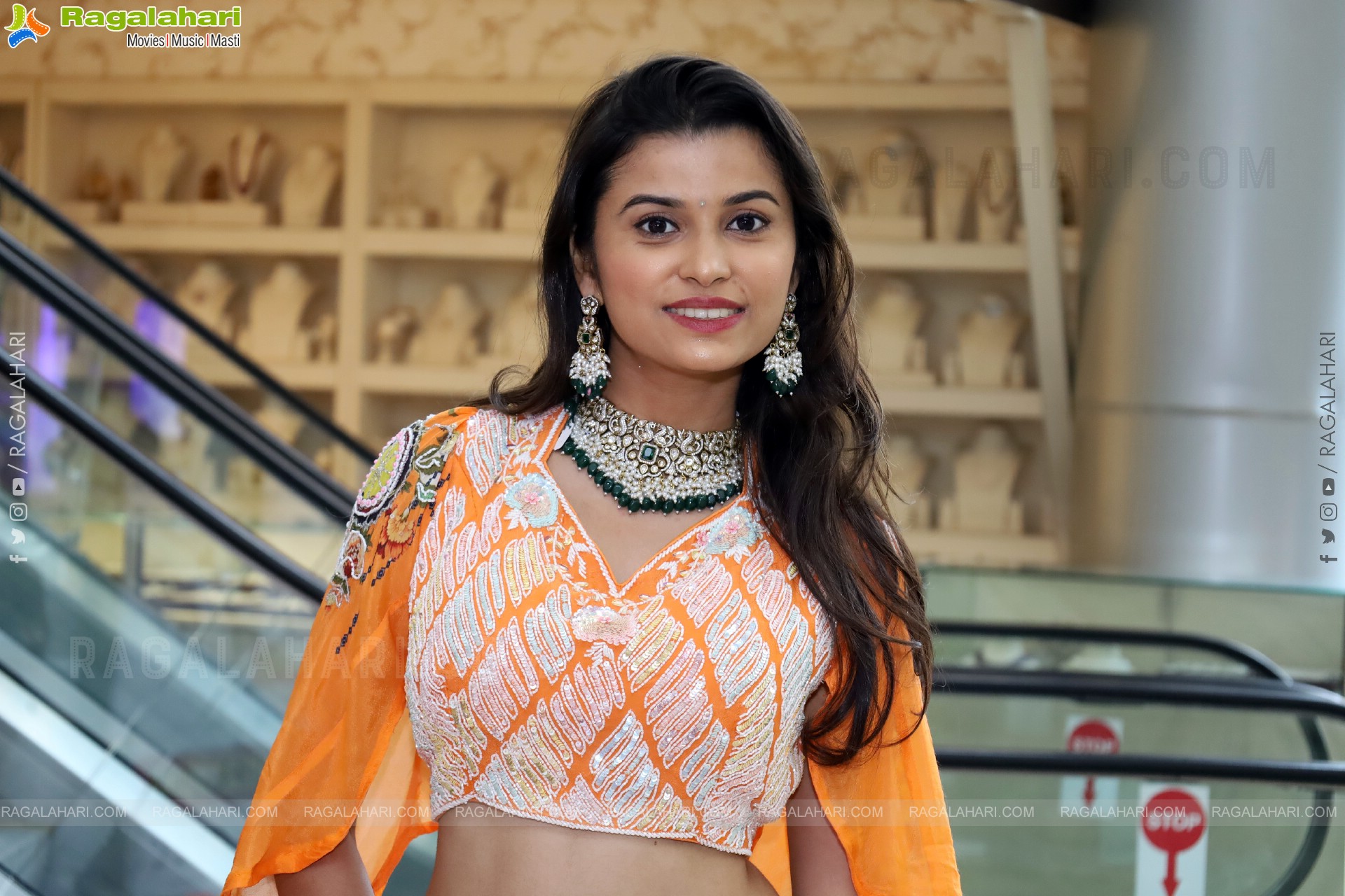 Akkhiila stills in Orange Designer Dress, HD Gallery