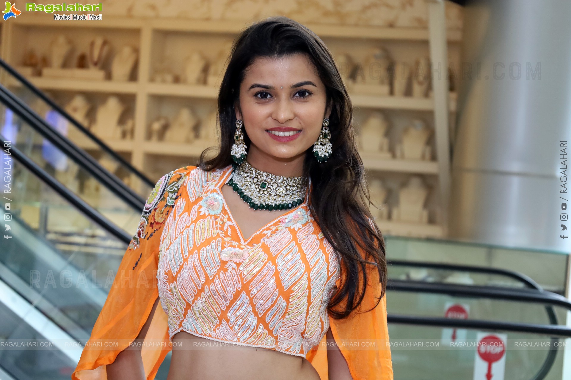 Akkhiila stills in Orange Designer Dress, HD Gallery