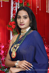 Hima Varma Glam stills in Elegant Royal Blue Saree