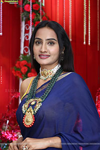 Hima Varma Glam stills in Elegant Royal Blue Saree