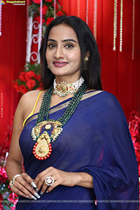 Hima Varma Glam stills in Elegant Royal Blue Saree