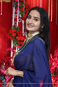 Hima Varma Glam stills in Elegant Royal Blue Saree
