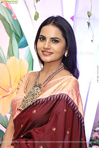 Priyanka Chowdary stills in Maroon Saree