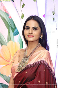 Priyanka Chowdary stills in Maroon Saree
