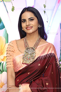 Priyanka Chowdary stills in Maroon Saree