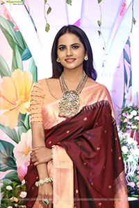 Priyanka Chowdary stills in Maroon Saree
