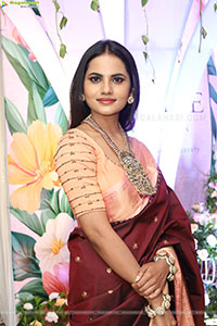 Priyanka Chowdary stills in Maroon Saree