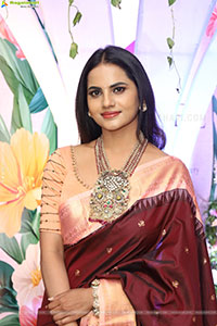 Priyanka Chowdary stills in Maroon Saree