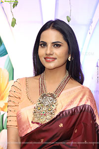 Priyanka Chowdary stills in Maroon Saree