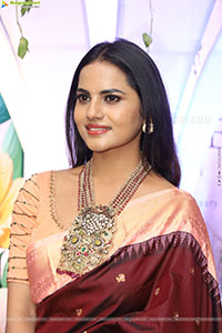 Priyanka Chowdary stills in Maroon Saree