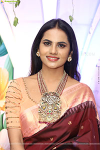 Priyanka Chowdary stills in Maroon Saree