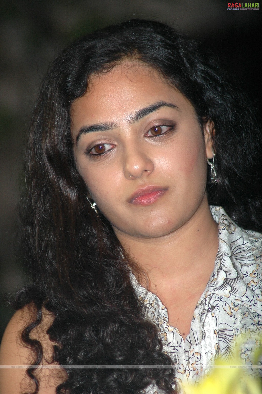 Nithya Menon at 180 Movie Press Meet, Hyderabad, Photo Gallery