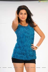 Shraddha Das in Sleeveless Blue Top and Black Short Skirt Photos