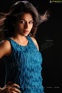 Shraddha Das in Sleeveless Blue Top and Black Short Skirt Photos