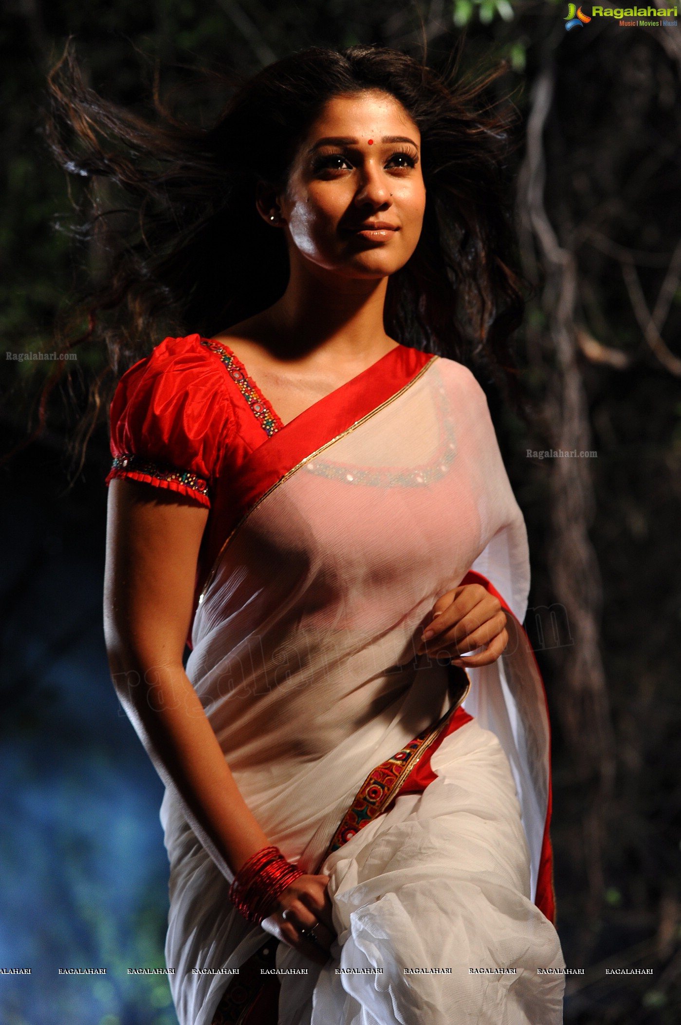 Nayanthara Stills in White Saree from Krishnam Vande Jagadgurum Song, Images