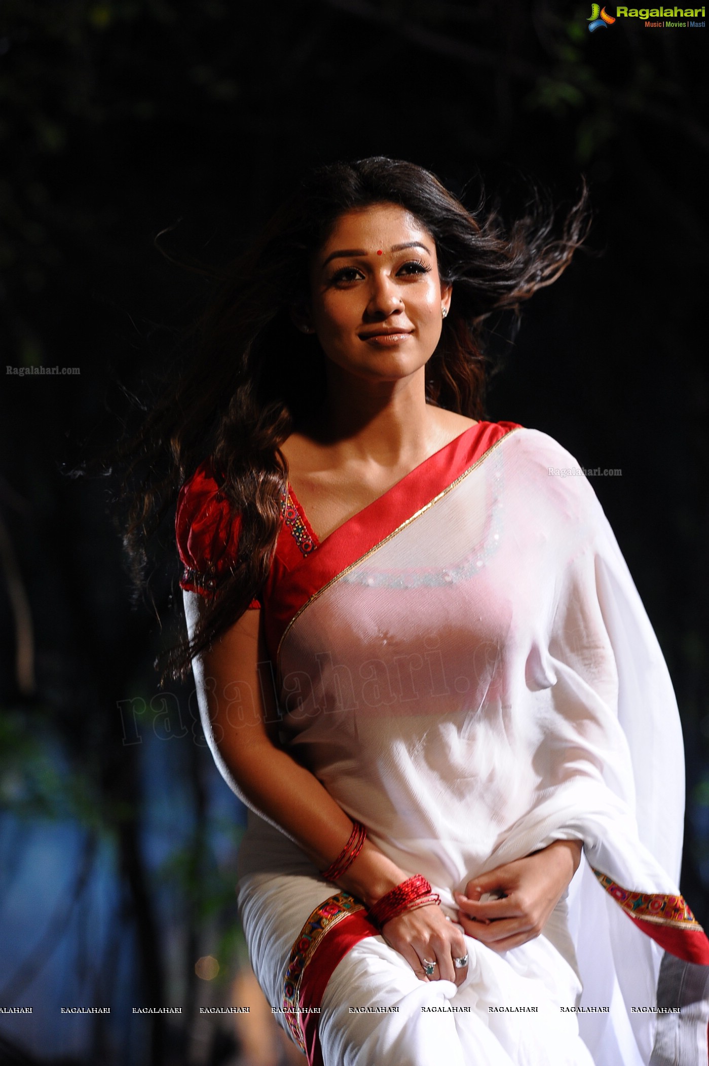 Nayanthara Stills in White Saree from Krishnam Vande Jagadgurum Song, Images