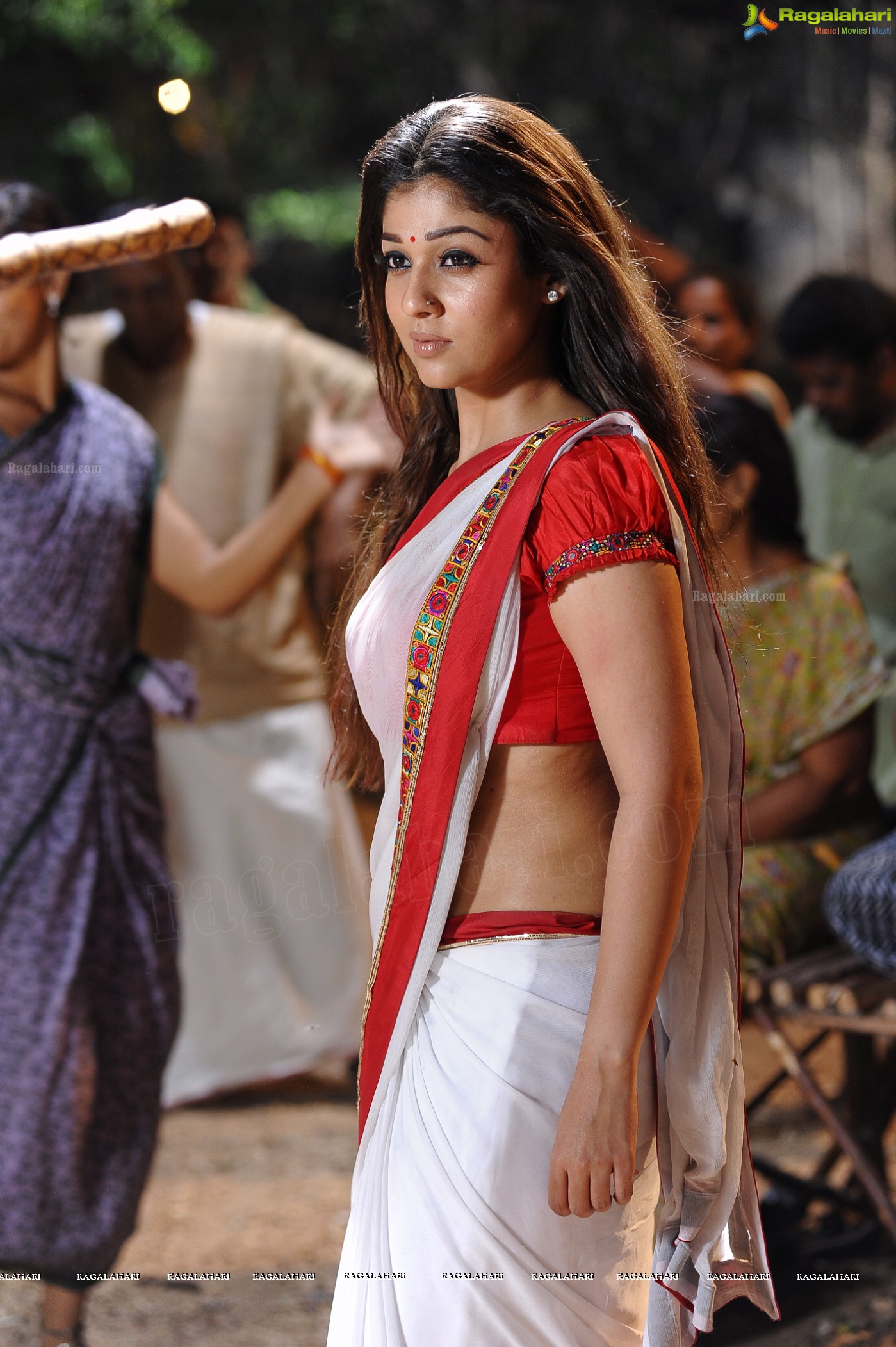 Nayanthara Stills in White Saree from Krishnam Vande Jagadgurum Song, Images