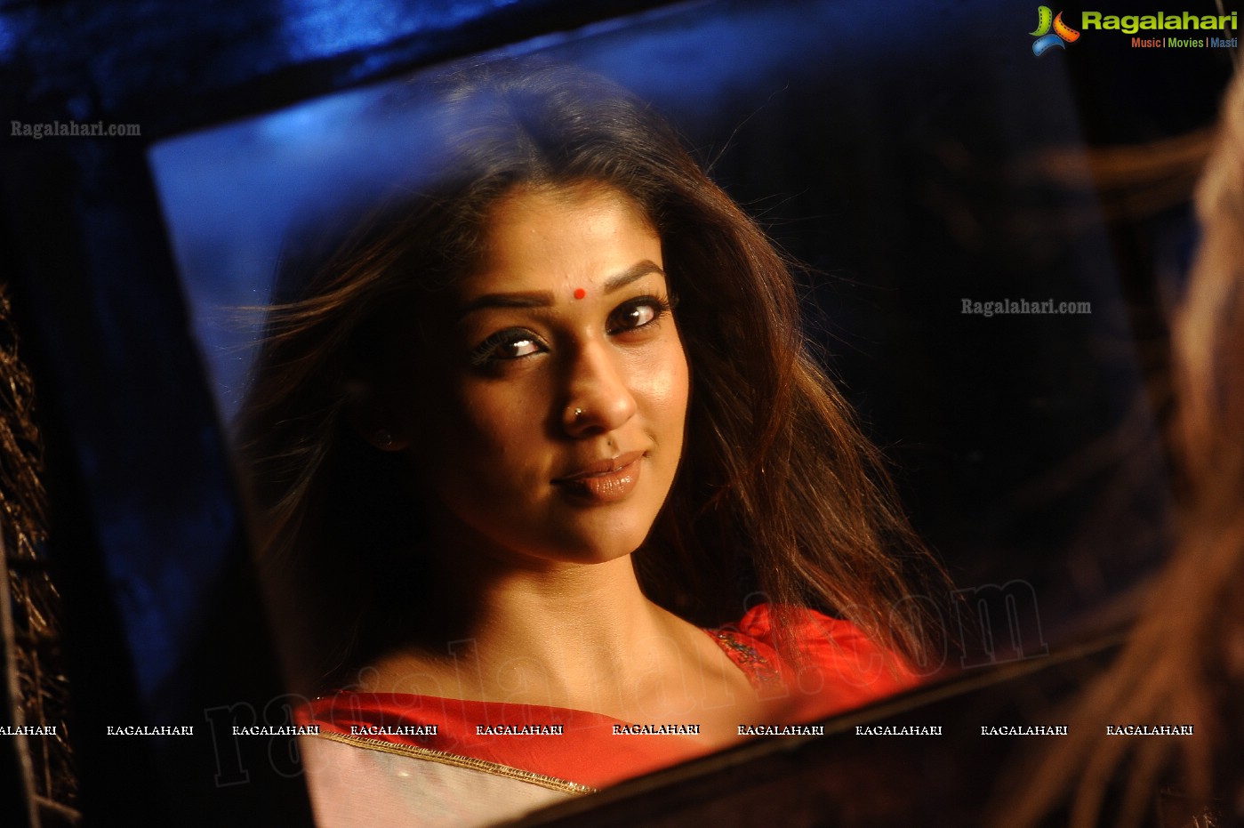 Nayanthara Stills in White Saree from Krishnam Vande Jagadgurum Song, Images