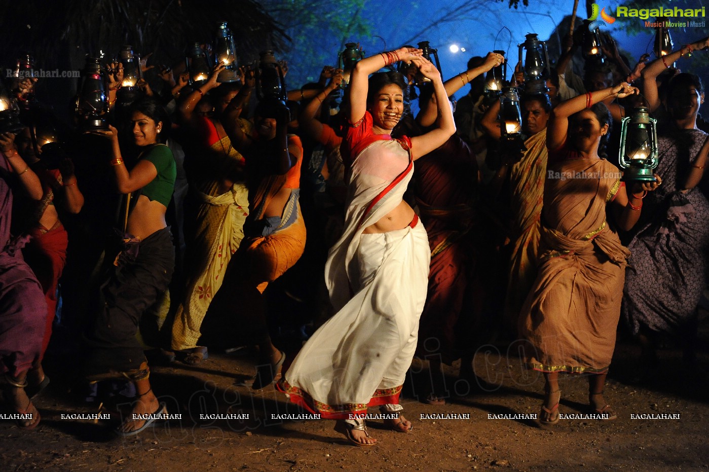 Nayanthara Stills in White Saree from Krishnam Vande Jagadgurum Song, Images