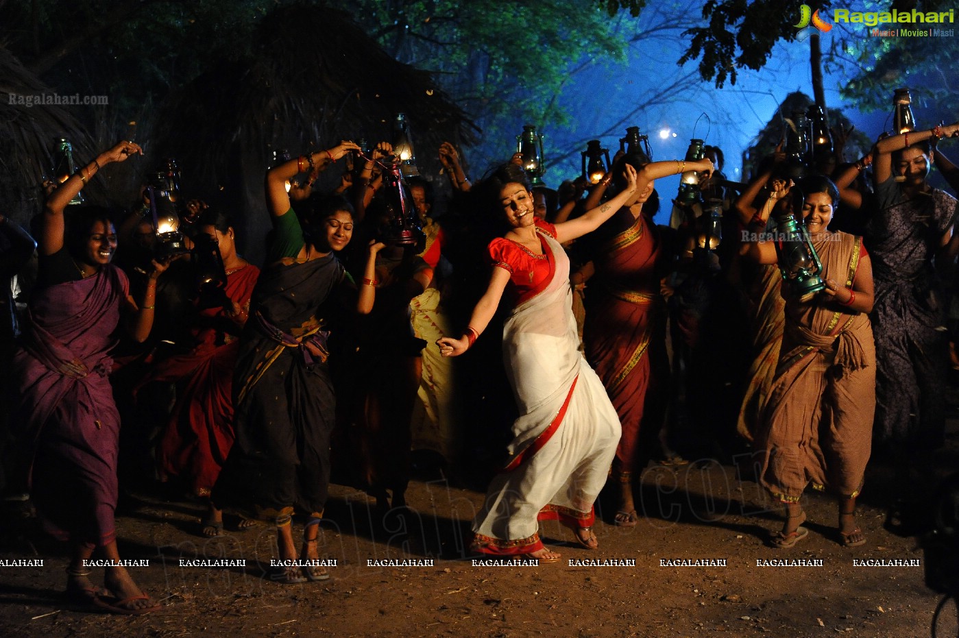 Nayanthara Stills in White Saree from Krishnam Vande Jagadgurum Song, Images