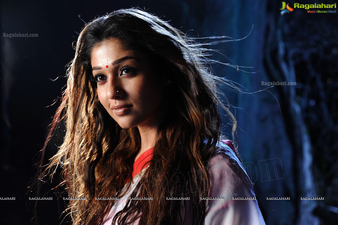 Nayanthara Stills in White Saree from Krishnam Vande Jagadgurum Song, Images