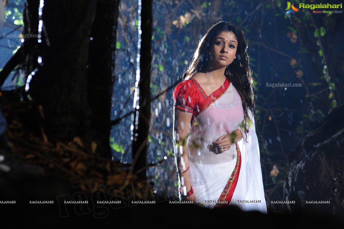 Nayanthara Stills in White Saree from Krishnam Vande Jagadgurum Song, Images