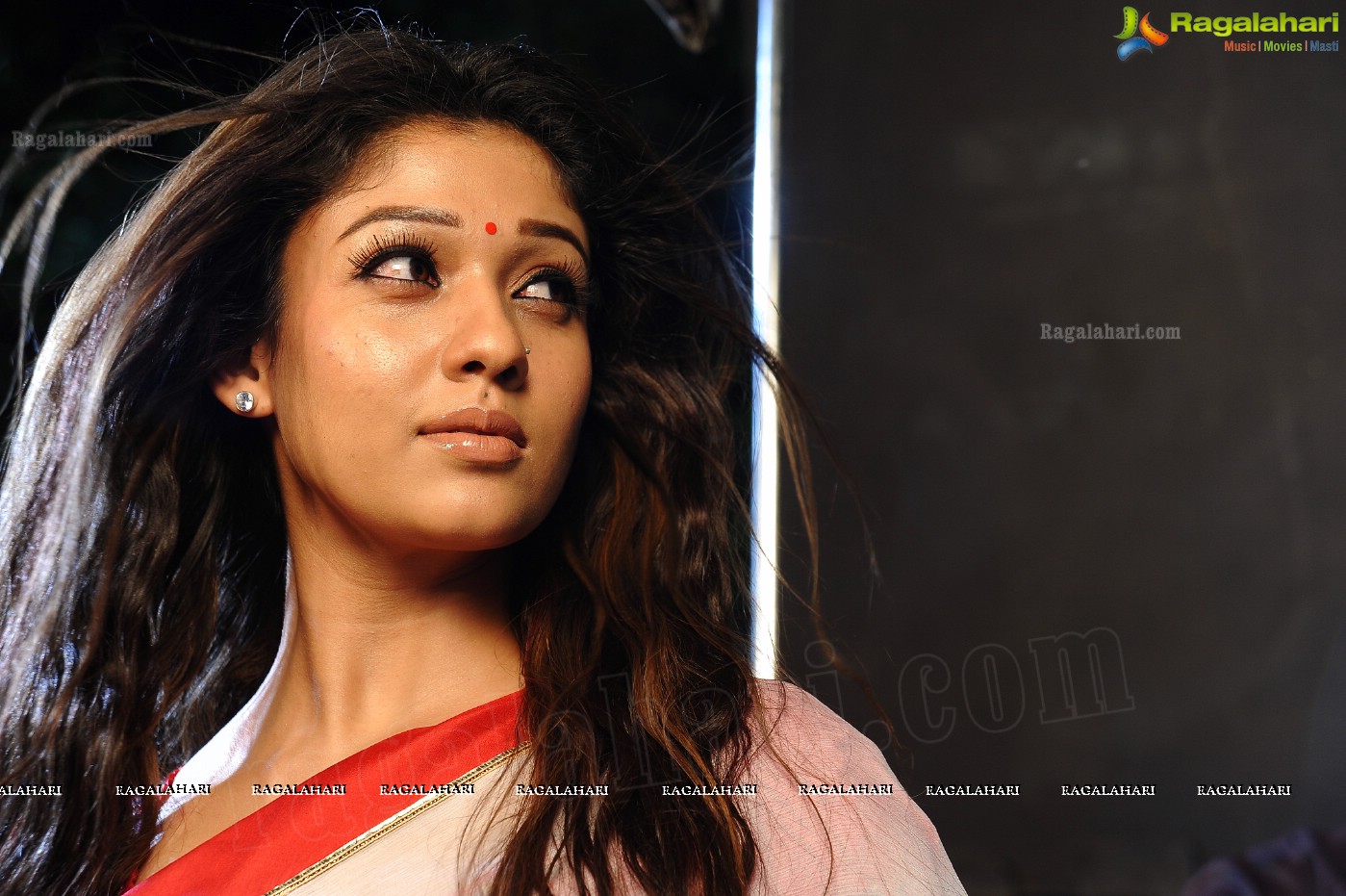 Nayanthara Stills in White Saree from Krishnam Vande Jagadgurum Song, Images