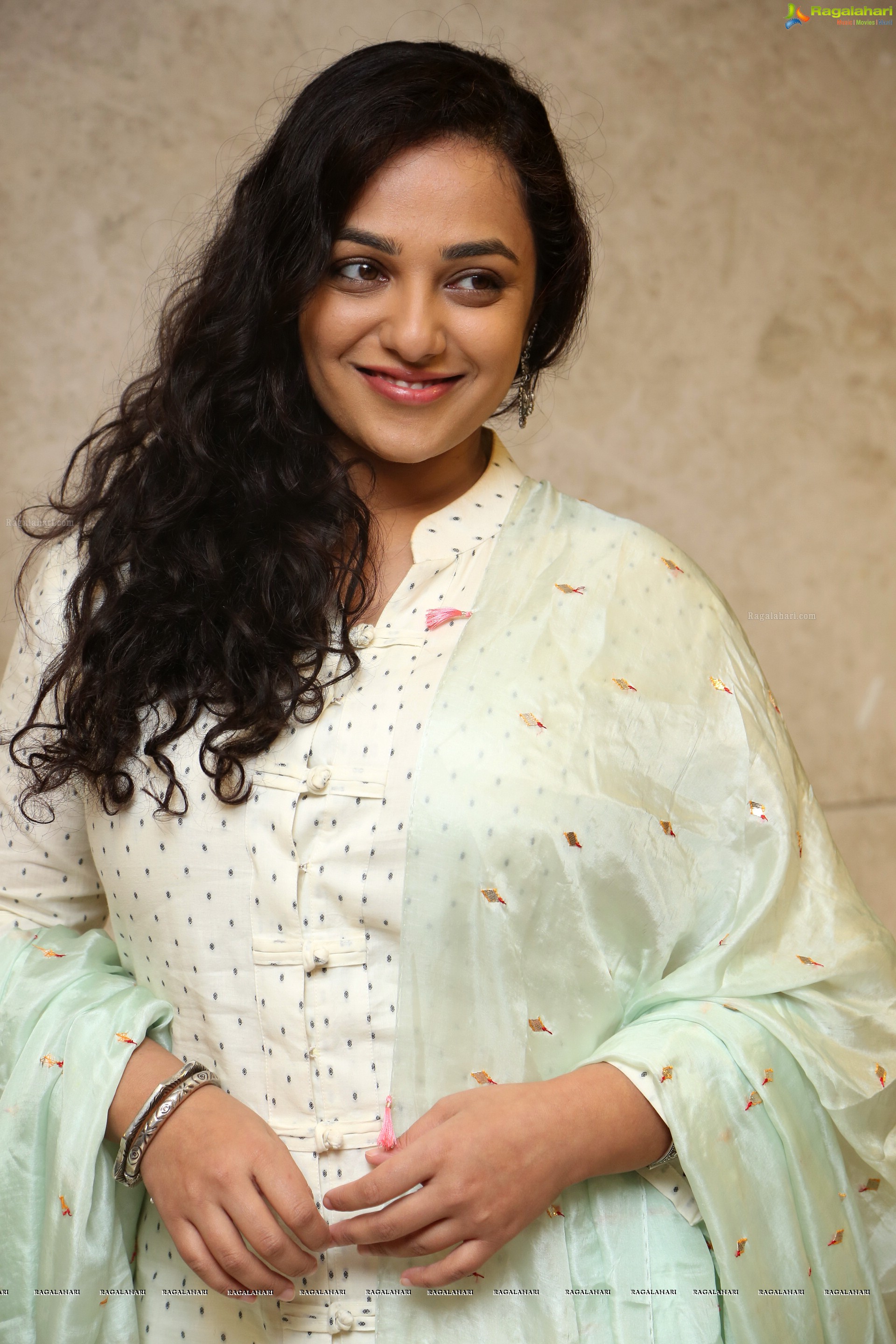 Nithya Menen at 100 Days of Love Audio Release, HD Gallery