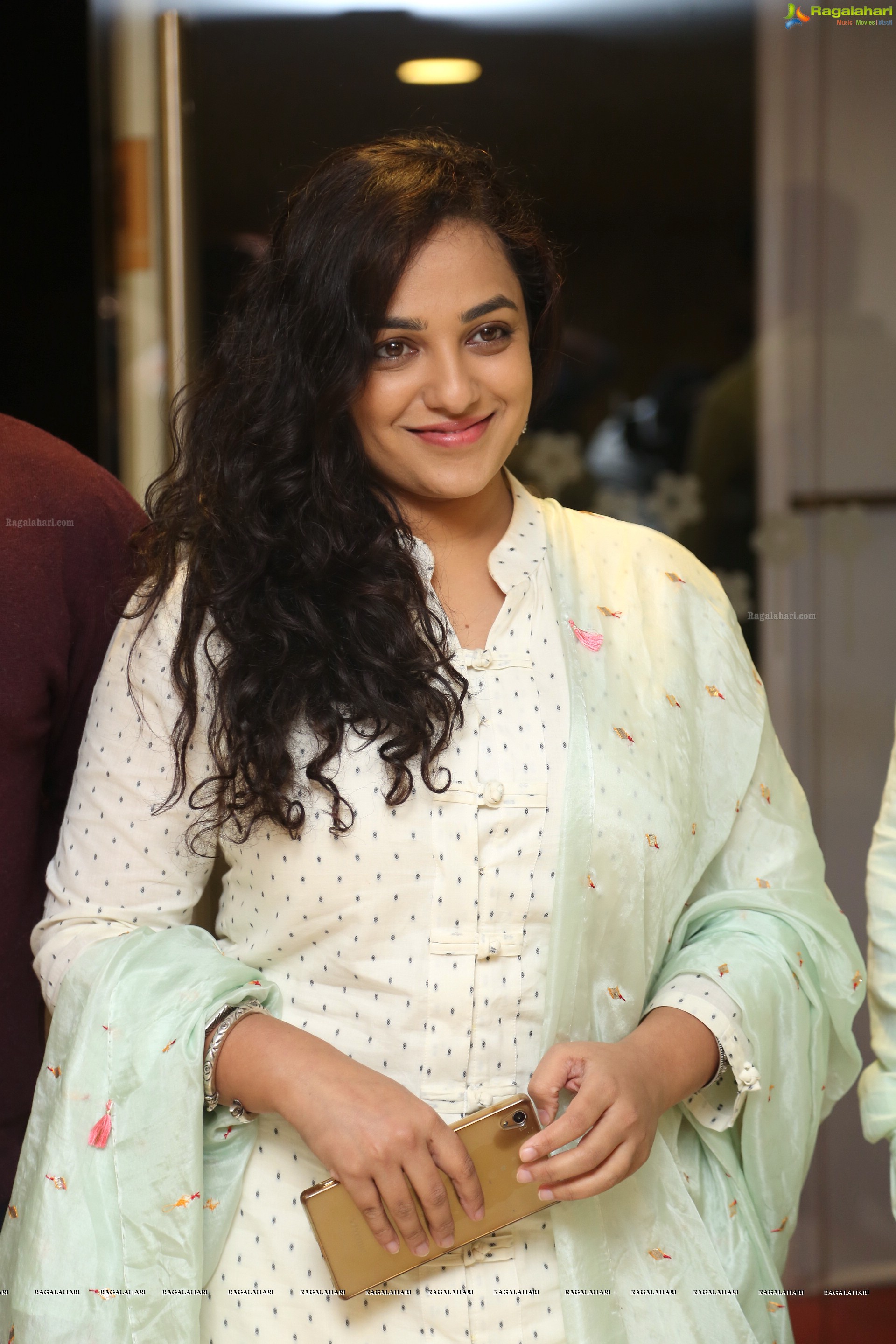 Nithya Menen at 100 Days of Love Audio Release, HD Gallery