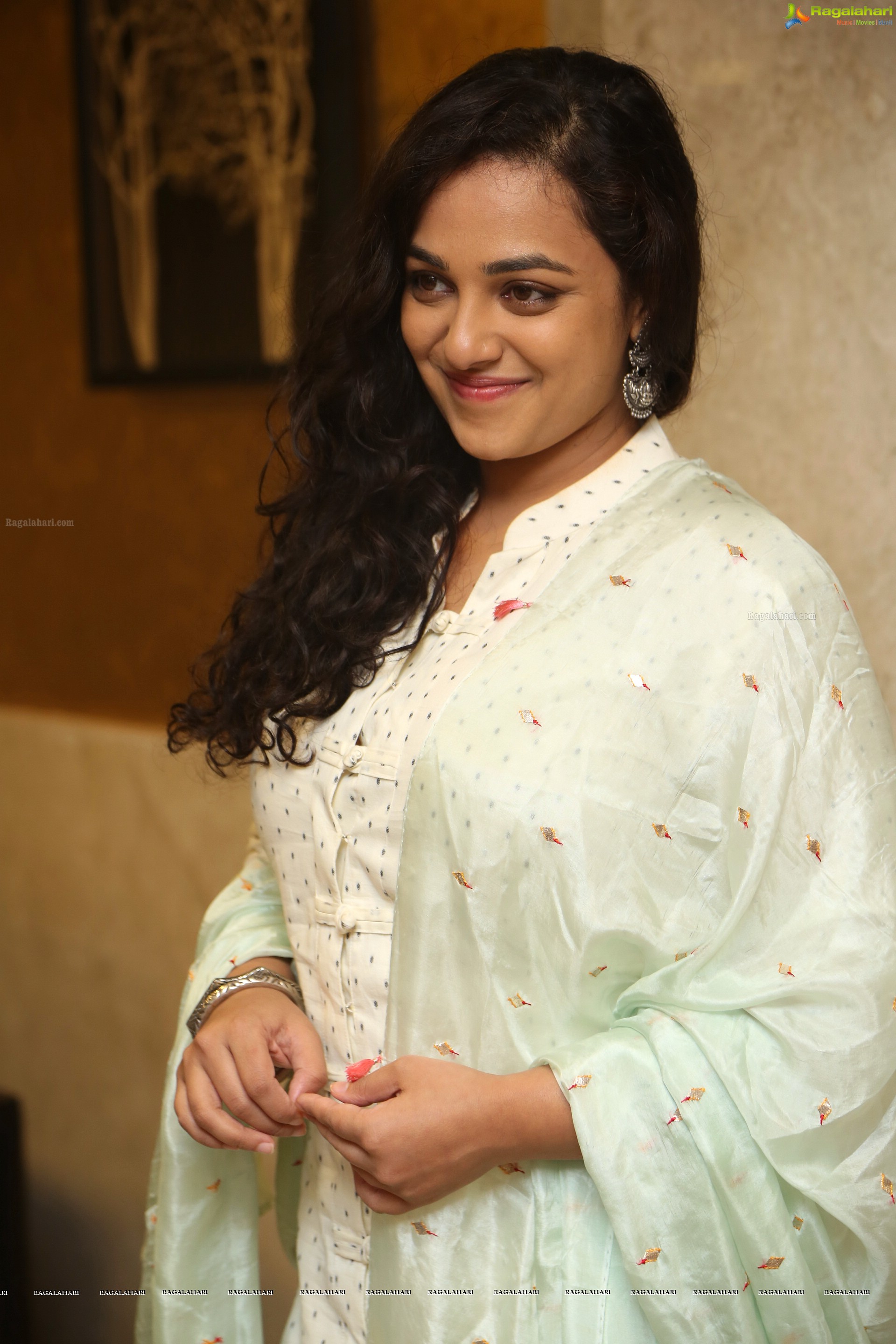 Nithya Menen at 100 Days of Love Audio Release, HD Gallery