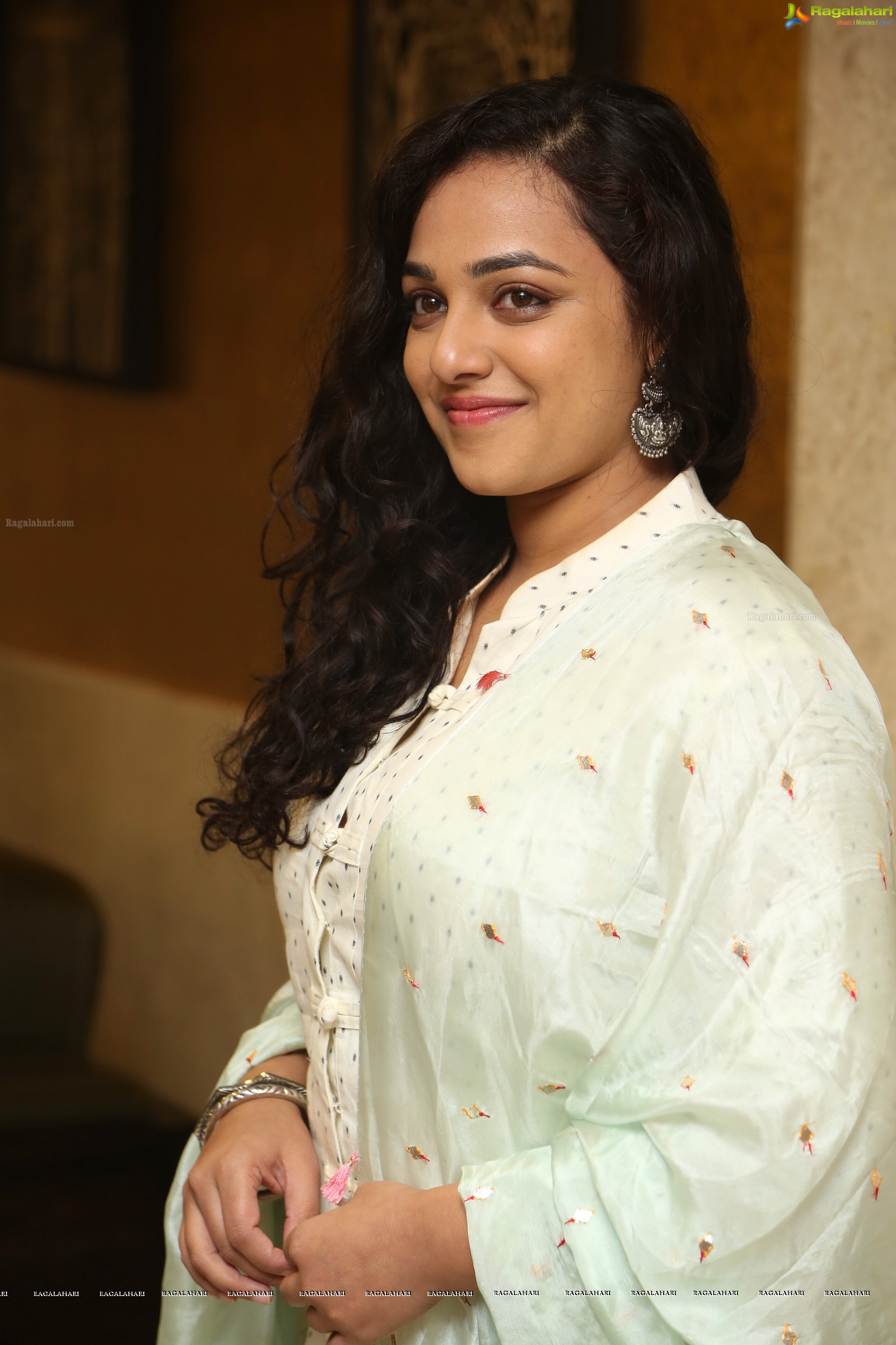 Nithya Menen at 100 Days of Love Audio Release, HD Gallery