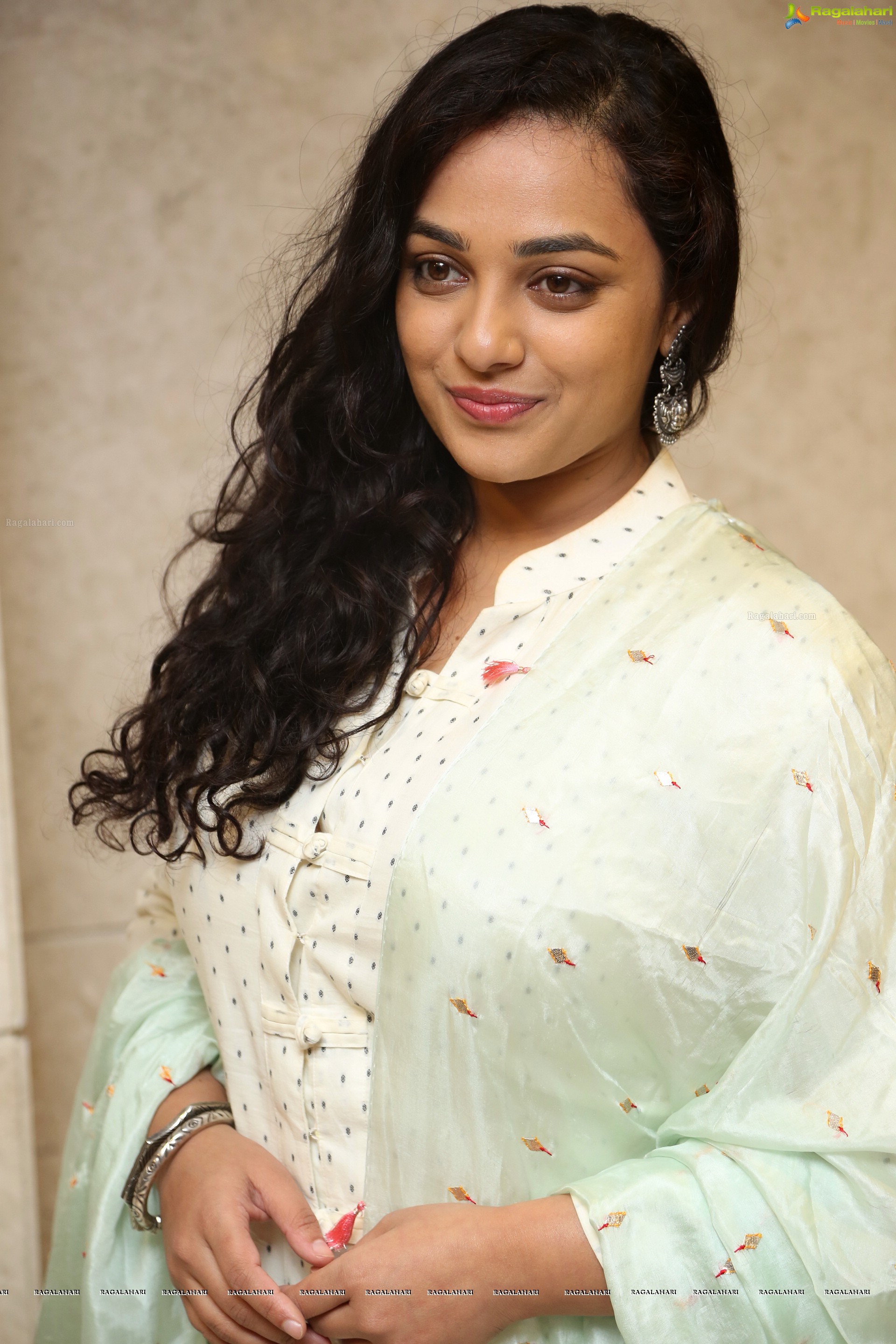 Nithya Menen at 100 Days of Love Audio Release, HD Gallery