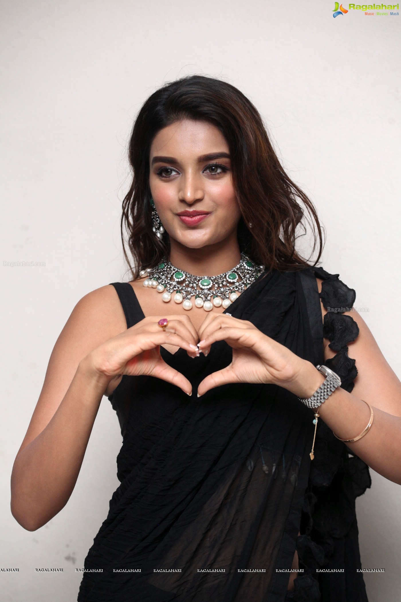 Nidhhi Agerwal (Posters) @ Ismart Shankar Pre-Release Event