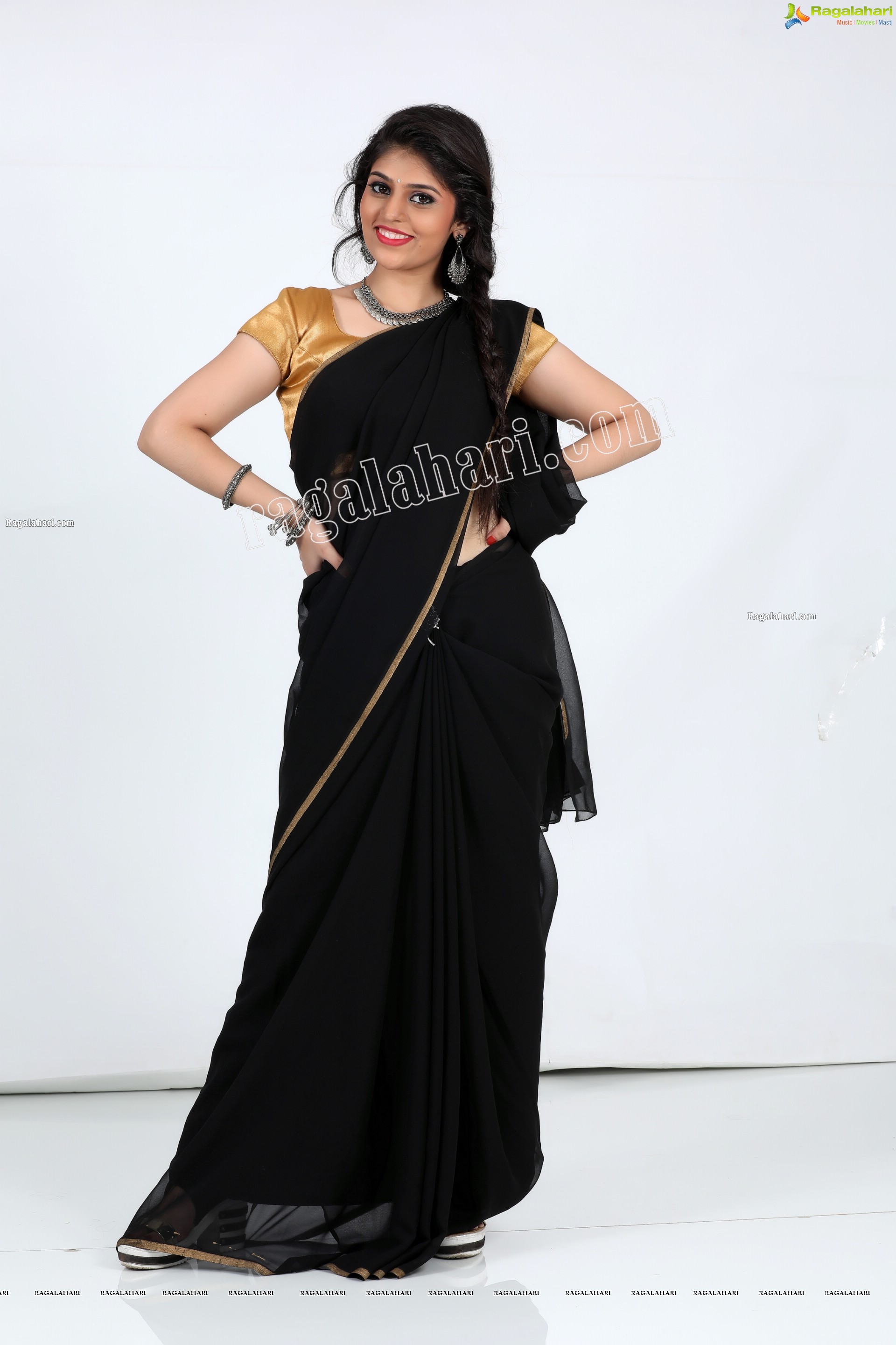 Viswa Sri Bandhavi in Plain Black Saree Exclusive Photo Shoot