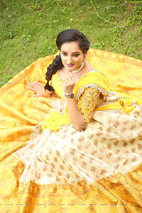 Madhu Krishnan in Cream and Yellow Lehenga Choli