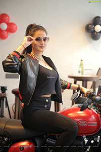 Nilofer Haidry Posing on a Bike Wearing Leather Jacket