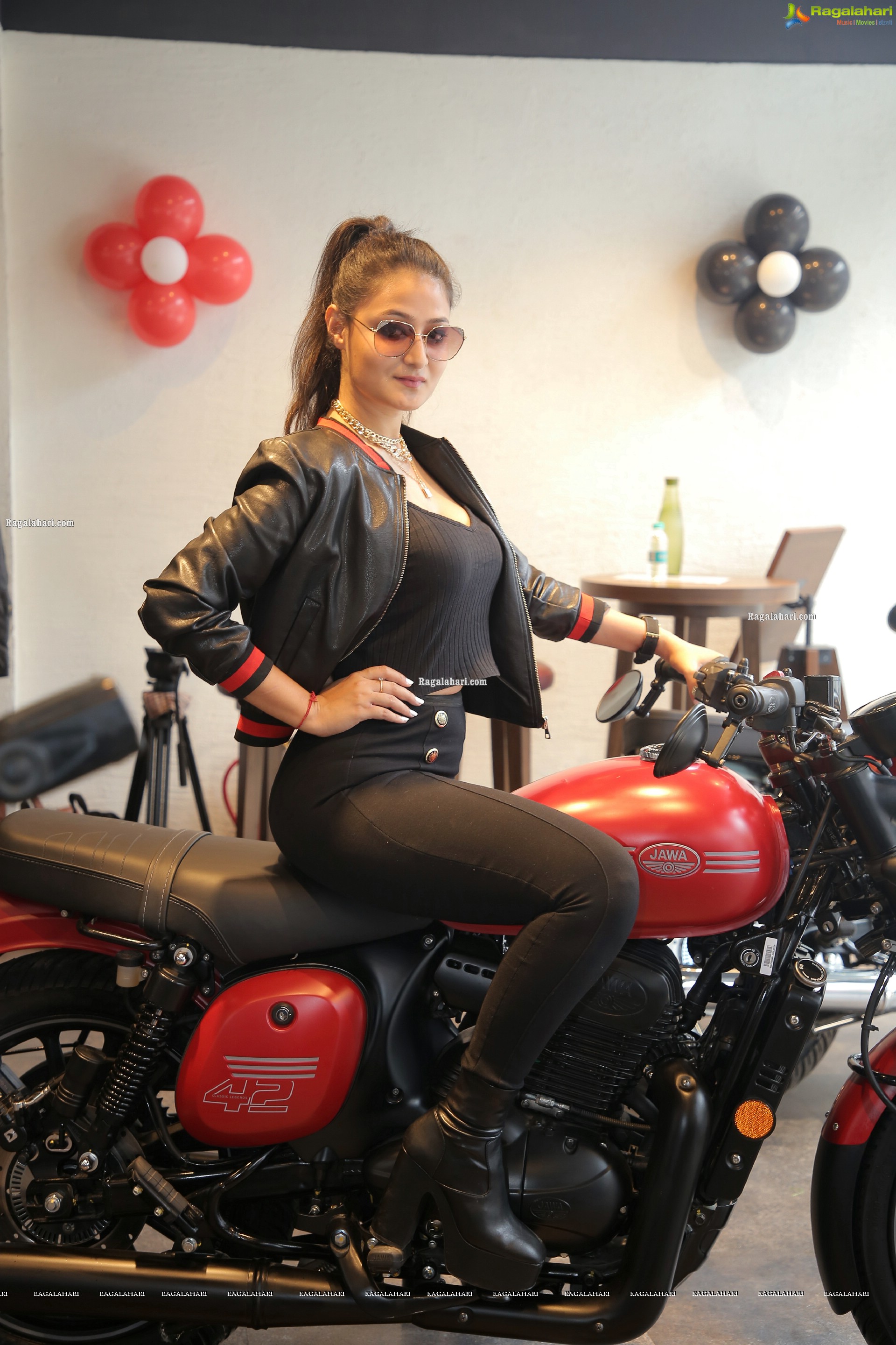 Nilofer Haidry Posing on a Bike Wearing Leather Jacket, HD Photo Gallery