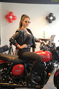 Nilofer Haidry Posing on a Bike Wearing Leather Jacket
