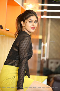 Sanjana Anand in Black Net Top and Yellow Mini Skirt