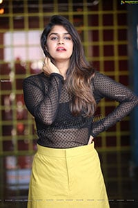 Sanjana Anand in Black Net Top and Yellow Mini Skirt