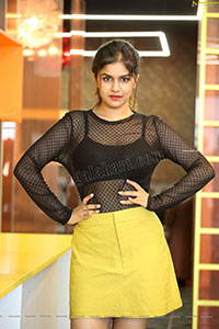 Sanjana Anand in Black Net Top and Yellow Mini Skirt