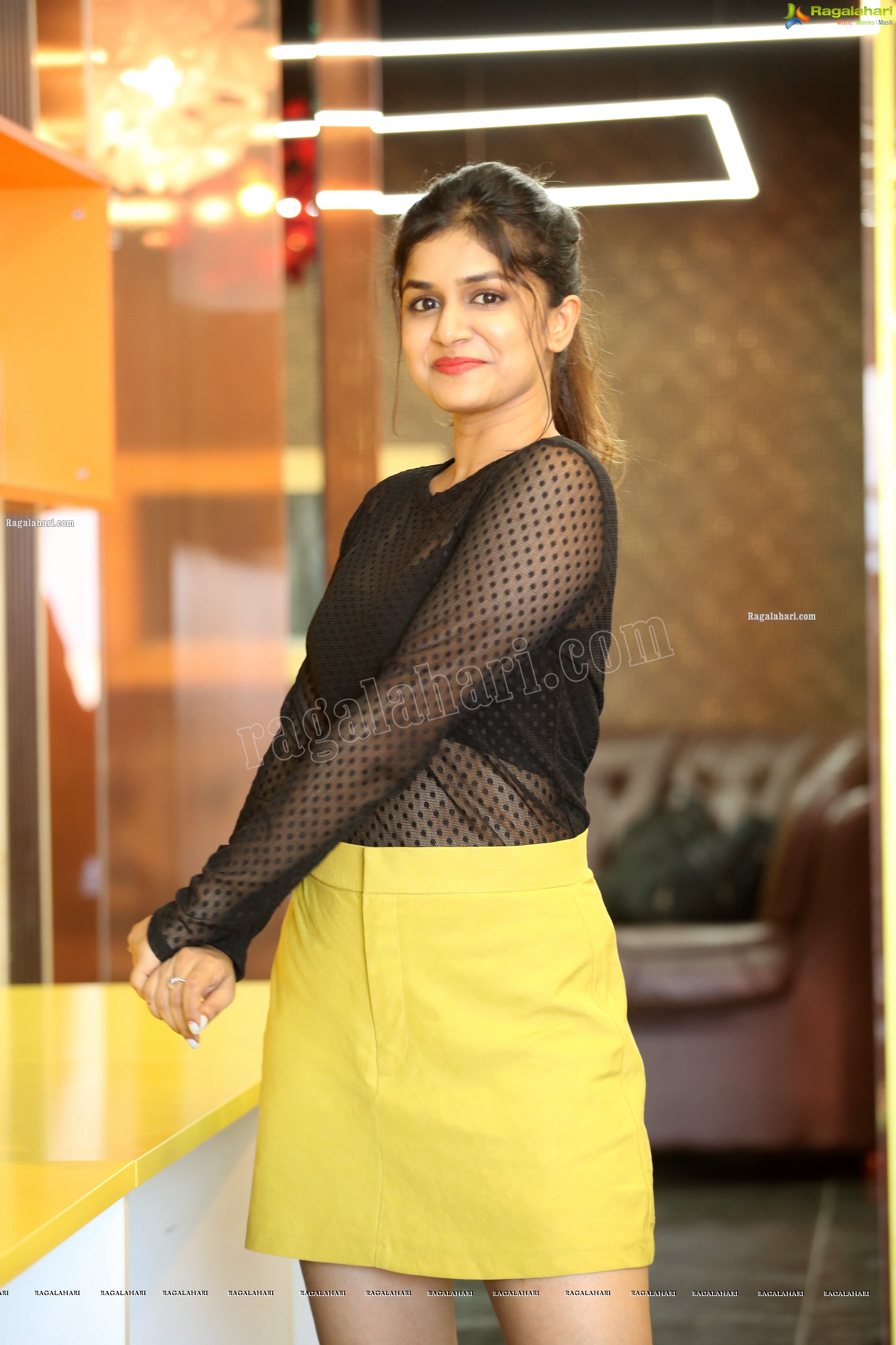 Sanjana Anand in Black Net Top and Yellow Mini Skirt, HD Photo Gallery