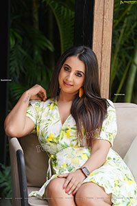 Sanjjanaa Galrani in White Floral Printed Mini Dress